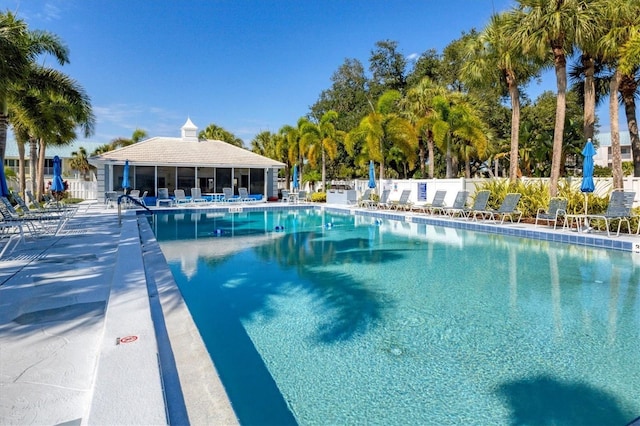 view of swimming pool with a patio area