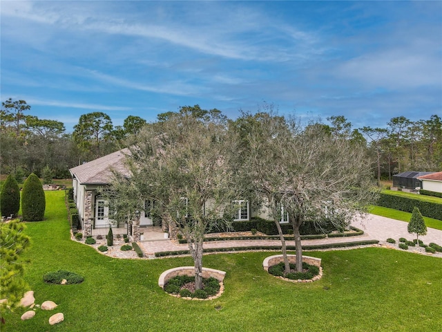 view of front of house with a front lawn and a porch