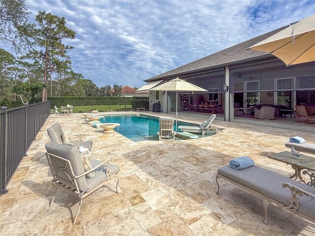 view of pool featuring a patio