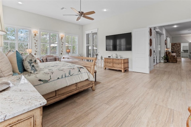 bedroom featuring ceiling fan and light wood-type flooring