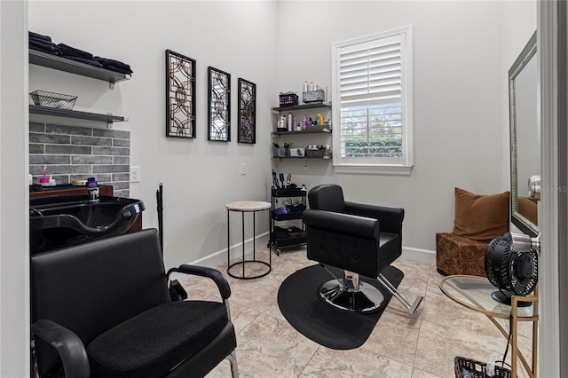 sitting room featuring light tile patterned floors