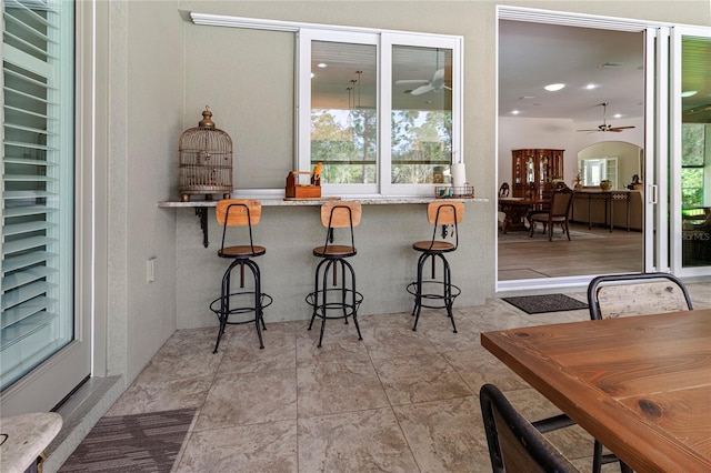 interior space with a kitchen bar