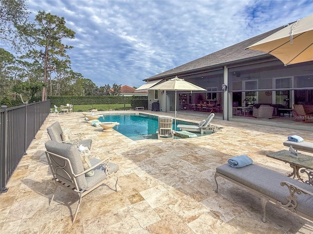 view of pool featuring a patio area