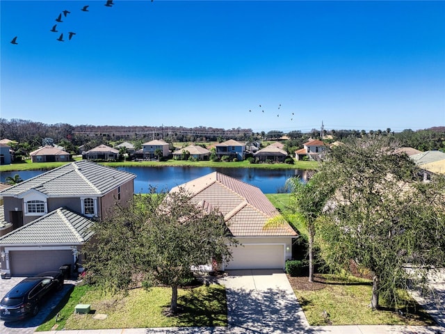 drone / aerial view featuring a water view