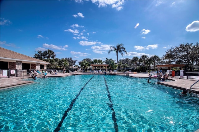 view of swimming pool with a patio area