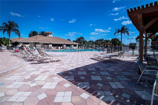 view of swimming pool with a patio area