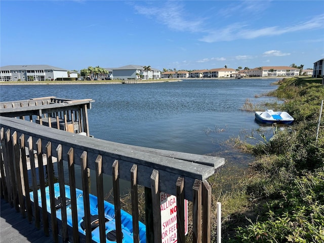 dock area featuring a water view