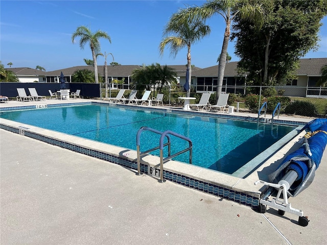 view of pool featuring a patio