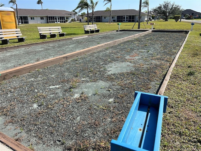 view of home's community with a lawn