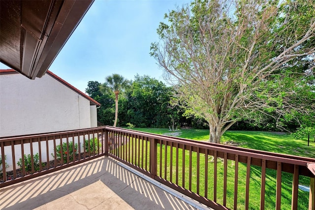 deck featuring a lawn