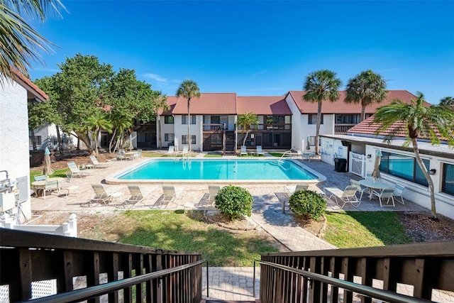 view of swimming pool featuring a patio