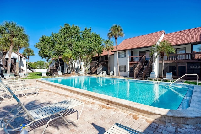 view of pool with a patio area