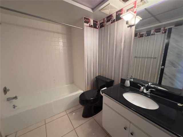 full bathroom featuring vanity, tile patterned floors, shower / bathtub combination, and toilet