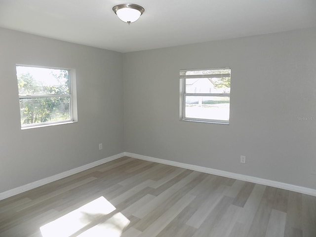 empty room featuring light hardwood / wood-style floors