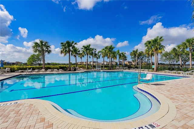 view of swimming pool featuring a patio