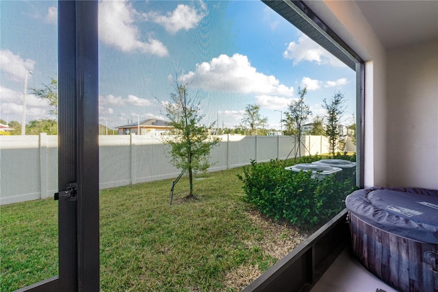 view of yard with a balcony