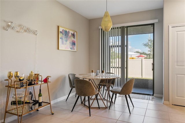 dining room featuring light tile patterned floors