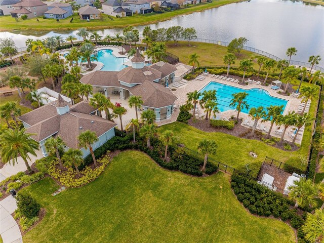 drone / aerial view with a water view