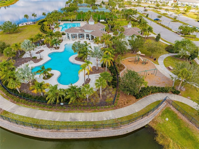 birds eye view of property with a water view