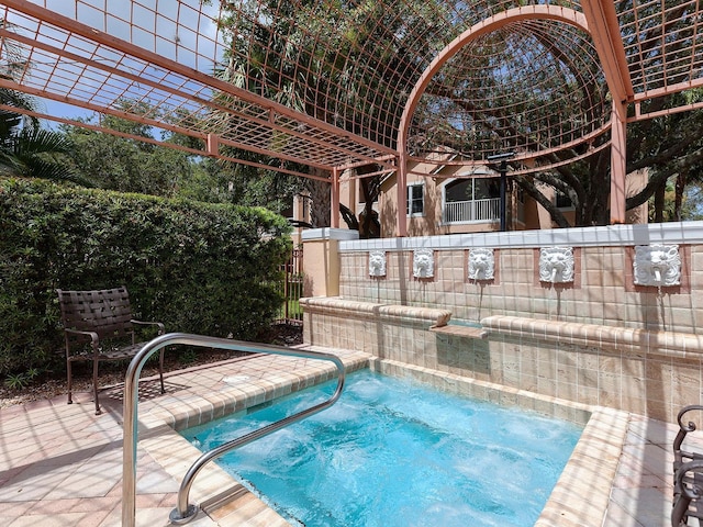 view of swimming pool with a pergola and an in ground hot tub