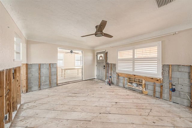 miscellaneous room featuring ceiling fan