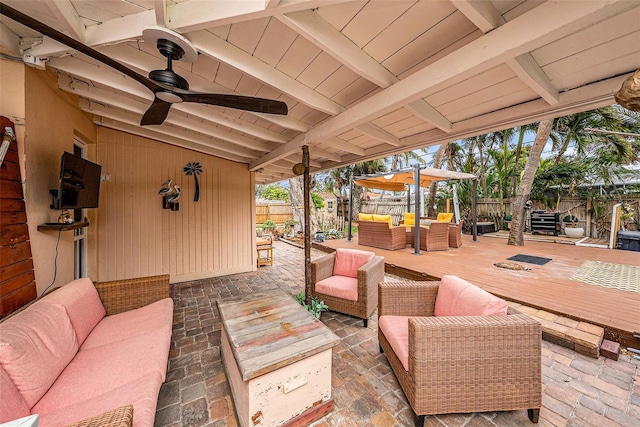 view of patio / terrace featuring outdoor lounge area, ceiling fan, and a deck