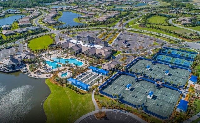 birds eye view of property featuring a water view