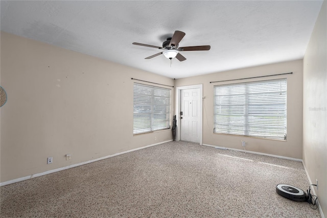 empty room with ceiling fan