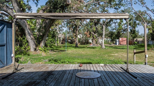 deck featuring a lawn