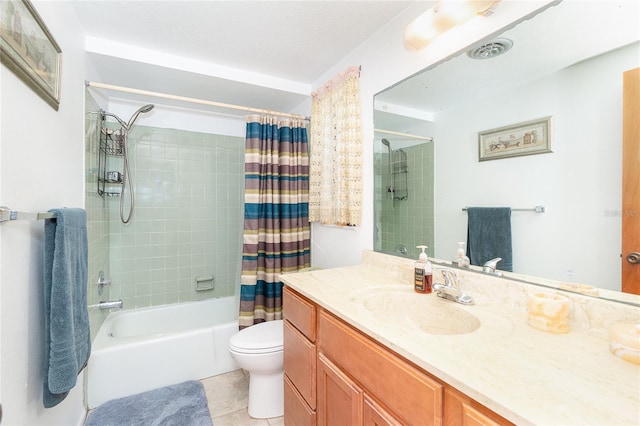 full bathroom with tile patterned flooring, shower / bath combo, vanity, and toilet