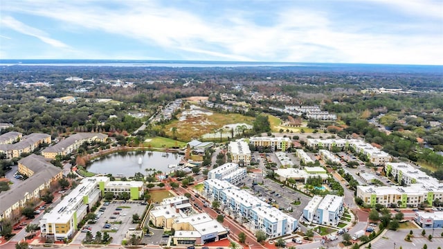 drone / aerial view with a water view