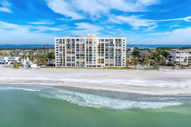 bird's eye view with a beach view and a water view