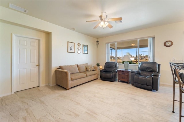 living room with ceiling fan