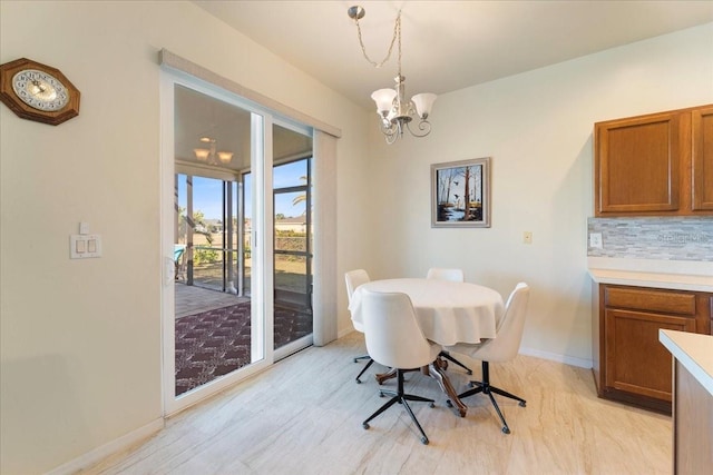 dining area featuring a chandelier