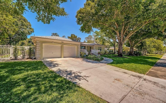 single story home with a front lawn and a garage