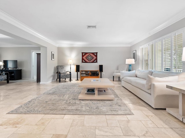 living room with ornamental molding