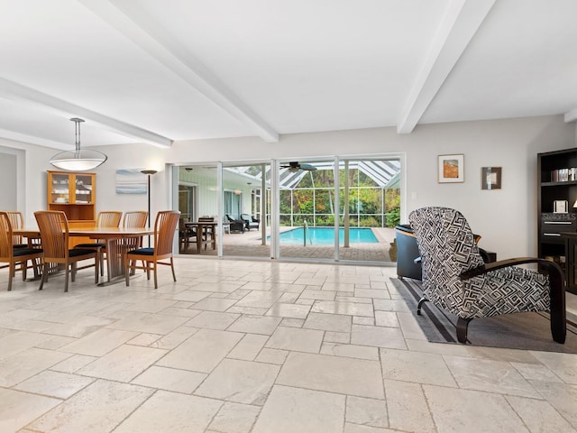 living room featuring beam ceiling