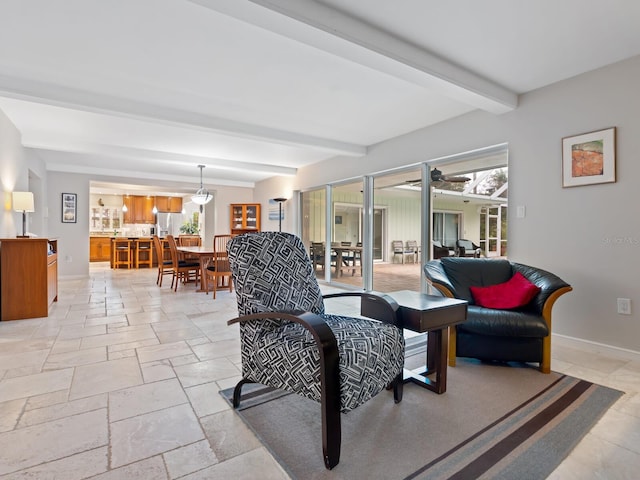 living room featuring beam ceiling