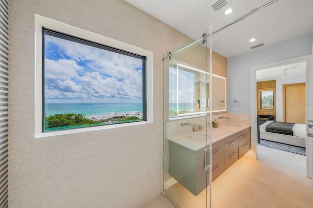 bathroom with vanity, tile patterned floors, a wealth of natural light, and ceiling fan