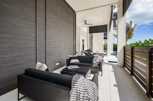 view of patio featuring an outdoor hangout area and ceiling fan