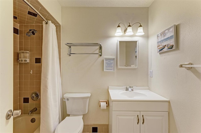 full bathroom featuring vanity, toilet, and shower / tub combo