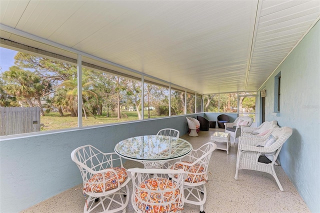 sunroom / solarium featuring plenty of natural light