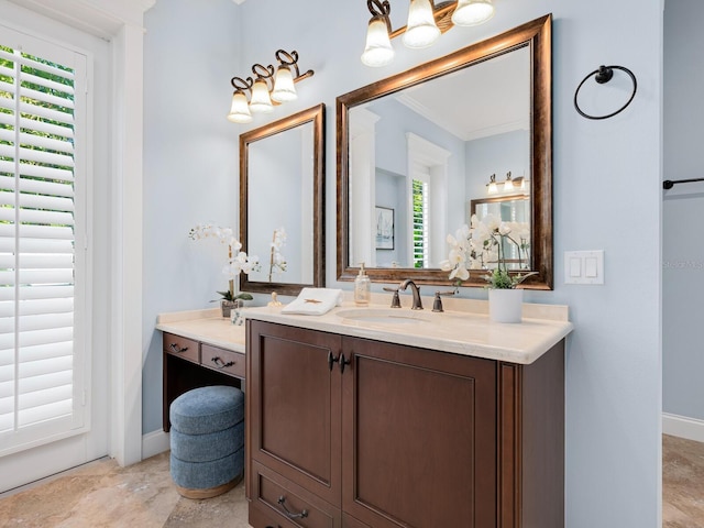 bathroom featuring vanity and ornamental molding