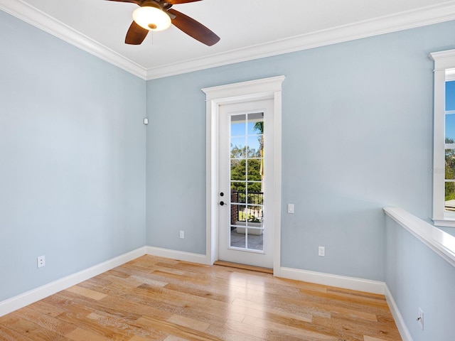 unfurnished room with crown molding, ceiling fan, and light wood-type flooring