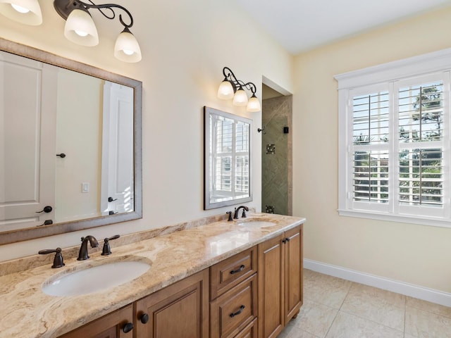 bathroom with tile patterned flooring, vanity, and a shower with door