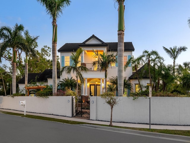 view of front of home with a balcony