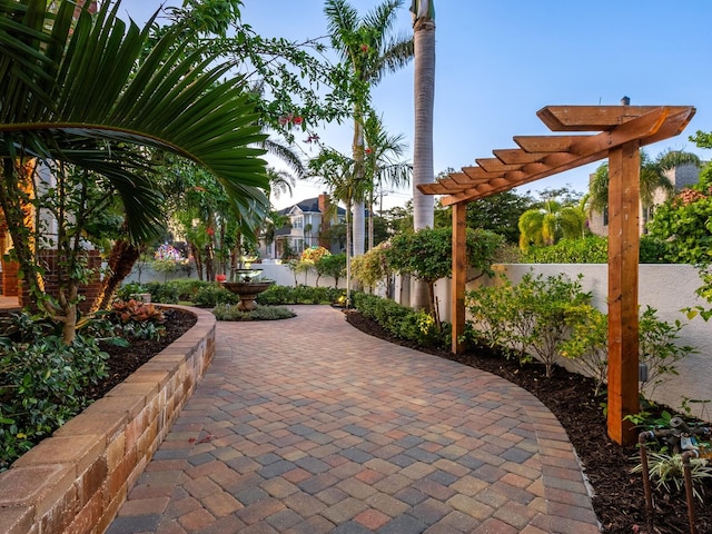 view of property's community with a patio