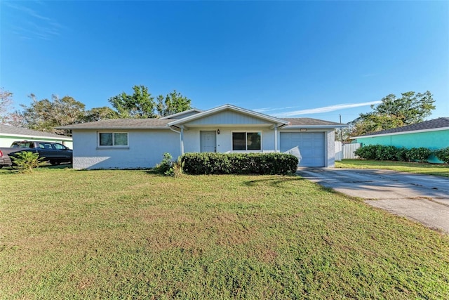 single story home with a garage and a front lawn