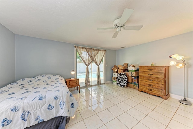 bedroom featuring ceiling fan and light tile patterned floors