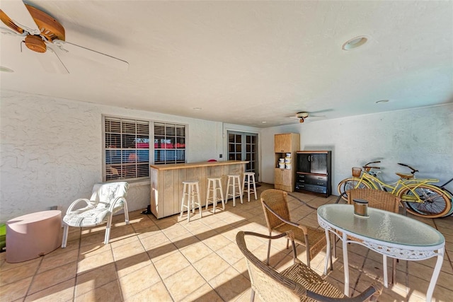 living room with light tile patterned floors